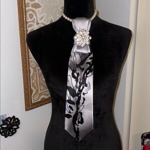 black and silver 100% silk tie used for the trend women reusing a man’s tie